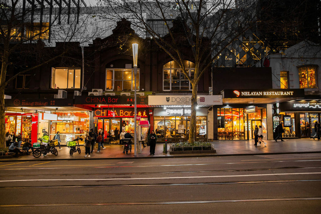 Melbourne Street With Various Cafes And Restaurants At Night