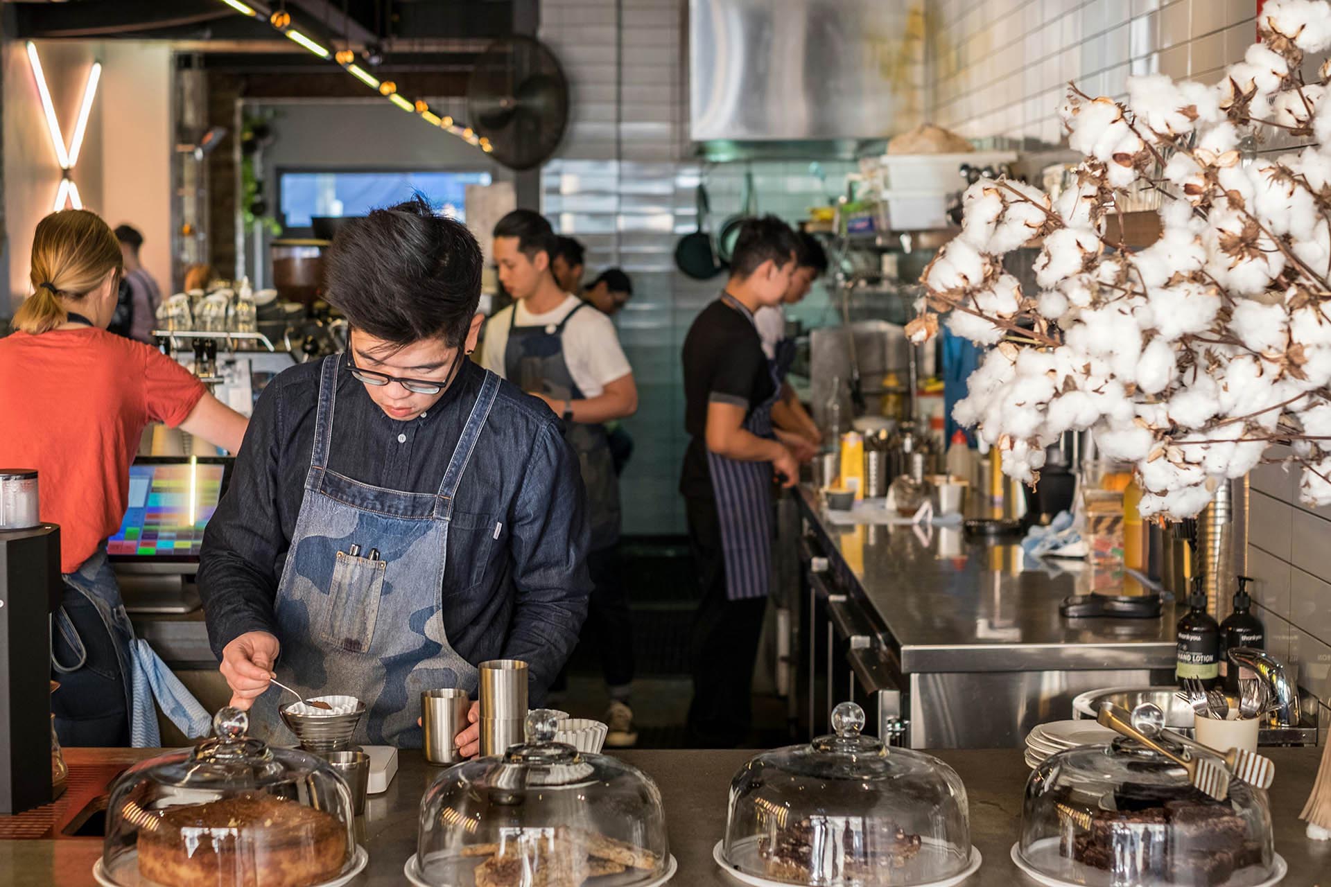 A Man Making Coffee In A Coffeeshop In Sydney